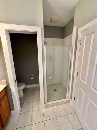 Bathroom with walk-in shower at Spacious Modern Hideaway