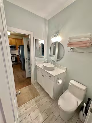 Bathroom with walk-in shower at Modern Cozy Home